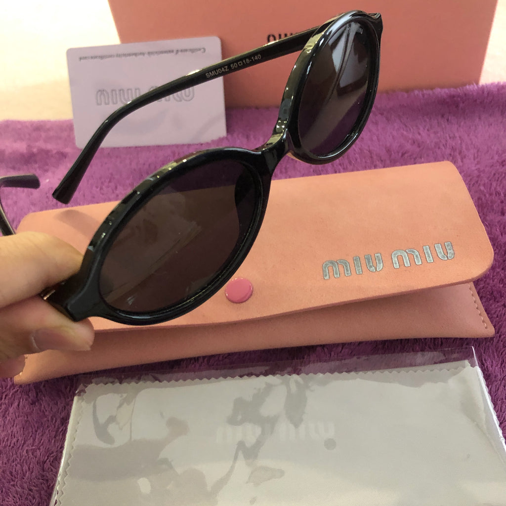 Sunglasses New MIU MIU MU04ZS VAU50D Honey Havana/Bordeaux